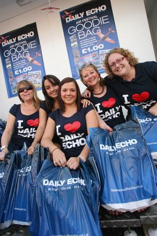 The team of girls selling the  Daily Echo goodie bag at the Bournemouth Air Festival 2011. Picture by Sally Adams