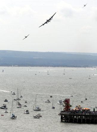 The Battle of Britain Memorial Flight featuring the Lancaster, Hurricane and Spitfire.
