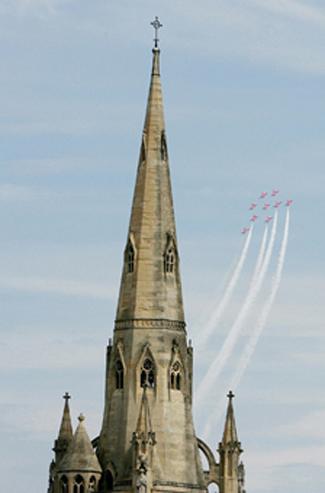 The  Red Arrows  Fly Past  St Peters Church  at  the     Bournemouth Air Festival 2011.