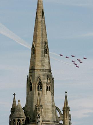 The  Red Arrows  Fly Past  St Peters Church  at  the     Bournemouth Air Festival 2011.