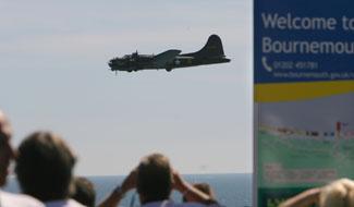 Saturday Flying display. The Sally B flies over the seafront.