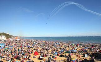 Saturday Flying display. A packed Bournemouth beach watch the Blades.