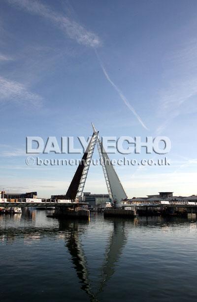 The Twin Sails Bridge fully lifted as seen from the Hamworthy Hochtief site. 20.10.11.