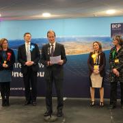 Graham Farrant, Acting Returning Officer and BCP Council Chief Executive announces Michael Tomlinson as winner of Mid Dorset and North Poole at the BIC on December 13, 2019, during the 2019 general election. Picture by BCP Council.