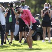 Georgia Hall, of England, hits a chip shot on the second hole of a sudden-death playoff during the final round of the LPGA Cambia Portland Classic golf tournament in Portland, Ore., Sunday, Sept. 20, 2020. Hall later won over South Africa's Ashleigh