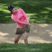 Georgia Hall, of England, plays from a green side bunker on the final hole of regulation during the final round of the LPGA Cambia Portland Classic golf tournament in Portland, Ore., Sunday, Sept. 20, 2020. Hall later won over South Africa's Ashleigh