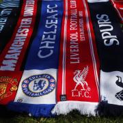A selection of scarves of the English soccer Premier League teams who are reported to be part of a proposed European Super League, laid out and photographed, in London, Monday, April 19, 2021.  The 12 European clubs planning to start a breakaway Super