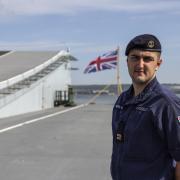 Pictured: Navy Storeman William Crossley on the Royal Navy’s newest aircraft carrier, HMS Prince of Wales