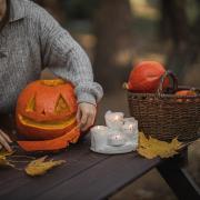 A child carving a pumpkin. Credit: Monstera from Pexels
