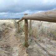 Cloudy skies and sand dunes at Studland by Keri Leigh Giguere of the Dorset Camera Club