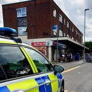 A police car outside a Spar store in Turlin Moor, Poole