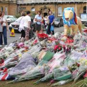 The mass of floral and other tributes to Red Arrows Pilot Fl Lt Jon Egging