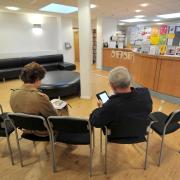 Patients in a GP waiting room