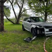 A Range Rover with severe damage has appeared near Whitecliff gate .