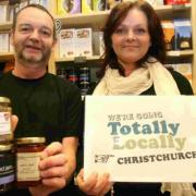IT’S HAPPENING:  Ian Cook of Heartizans Deli in Christchurch, with Cheryl Dennett, organiser of the Totally Locally campaign