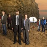The cast of Broadchurch on the beach at West Bay
