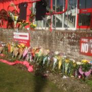 Tributes outside Ringwood fire station, where the press conference is being held