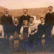 CLOSE KNIT: The family of Albert Cosser, who is on the far right, standing