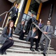TRANSFORMATION: Principal Richard Tutt with some of his Magna Academy students