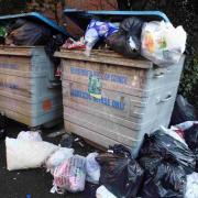Bins left to overflow in waste backlog