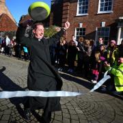 GALLERY: Fun, frying pans and fast-footed vicar: hundreds turn out for Pancake Day races in Christchurch