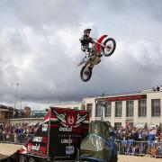 Bournemouth Wheels Festival - Stunt Motorbike action  from The FMX  Arena on the East beach