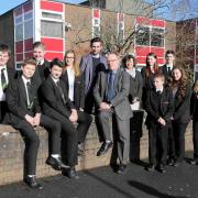 Ferndown Upper School head teacher Alex Wills with pupils and staff