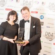 WINNER: Dr Gelareh Roushan of Bournemouth University presents the Entrepreneur of the Year title to Trelawney Dampney of Eco Sustainable Solutions at the 2014 Dorset Business Awards