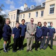 Headteacher, Chris Willsher with some of the pupils.