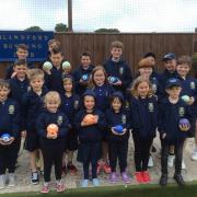 BOWLED OVER: Blandford Bowls Club junior members with their bowls and hoodies, courtesy of Tesco