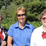 Singles winner Julie Leake with vice-president Betty Blunden (blazer) and competitiions secretary Jane Sargent.