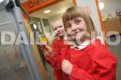  Sylvan First School in Parkstone, Isabella Stephens and Oliver Hyslop enjoy painting. 