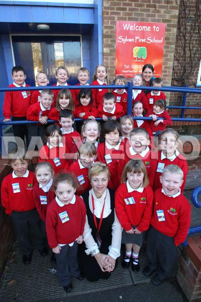  Sylvan First School in Parkstone,  Head Teacher Sarah Lee with members of the School Council.