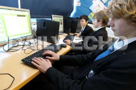R-L are: Matthew Bradshaw, 14, Jack Jordan, 14, and Ben Reeves, 13 in a year nine IT lesson.