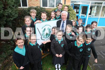 Hillbourne School and Nursery in Poole, 21.2.12. Head Teacher  Ken Taylor with pupils outside the school.