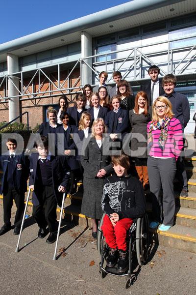  Head Teacher Pola Bevan, centre, with pupils from the school.