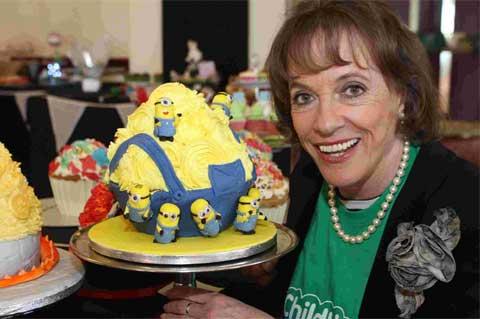 TASTY: Esther Rantzen  with a giant cupcake of Minions from the film Despicable Me. ID: 14082521
