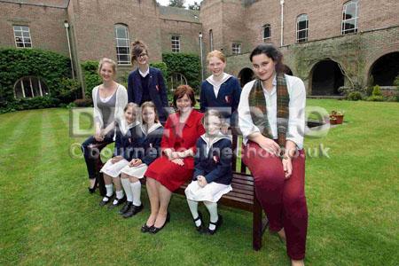 Head Teacher Angharad Holloway, centre, with pupils from both the senior and junior schools.