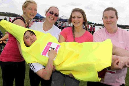 Thousands of women took to Poole Park to take part in the afternoon 5k Race For Life on June 24.