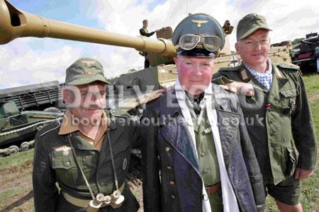 Around 10,000 people attended the 10th Tankfest celebration at the Bovington Tank Museum. (L-R) Mark Sasse, Stephen Phillips and Kevin Slade with a Tiger Tank from WWII