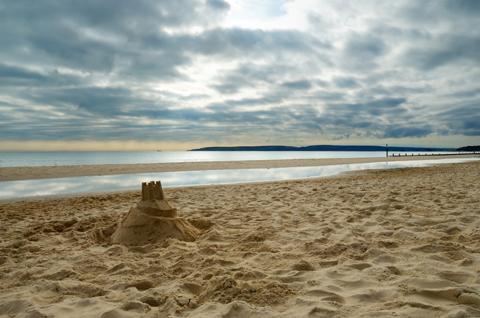 A sandcastle on the beach in Bournemouth, 
Taken by Becky Stares.
