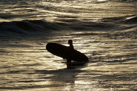 Surfers in the Sea at Boscombe Beach. Taken by Steve Tydeman of Springbourne.