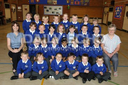 Reception class children at Longfleet C of E (VA) Combined  School  in Poole with Teacher Katie Fowler, left, and TA Yvonne Cavell