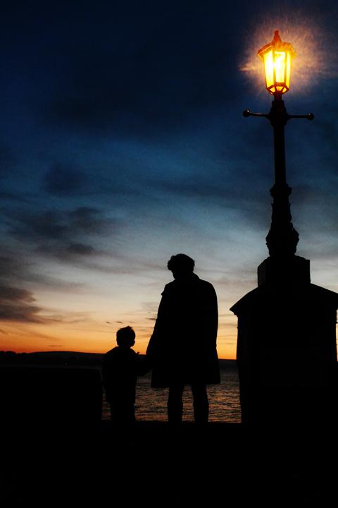This is a photograph of my mum and brother at Sandbanks in December.  We had been for a late afternoon walk along the beach and stopped to watch the sunset on the way home. Picture by Jenna Giles-Bodilly