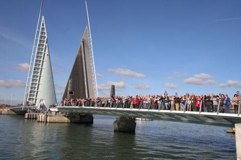 Poole residents take the opportunity to walk across the Twin Sails Bridge during the community weekend.