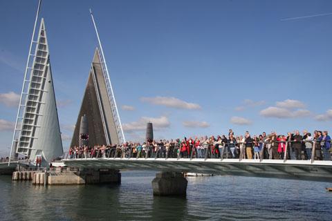 Poole residents take the opportunity of walking across the Twin Sails bridge during the community weekend.