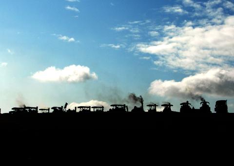 Steam Engines silhouetted at The Great Dorset Steam Fair. By Paul Morris.