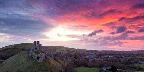 Corfe Castle winter sunrise by Paul Reiffer