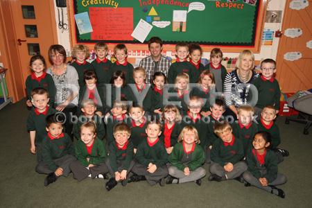 Reception children  in Diamonds class at  Broadstone First School with Teacher Doug  Gubbins, centre, and TA's Liz Northover,left, and Pearl Chisman.