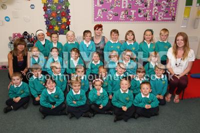 Reception class children at  Muscliff Primary School with Teacher  Lauren Callaghan, centre, and TA's, Kate Doidge,left, and Hannah Hayward, right.